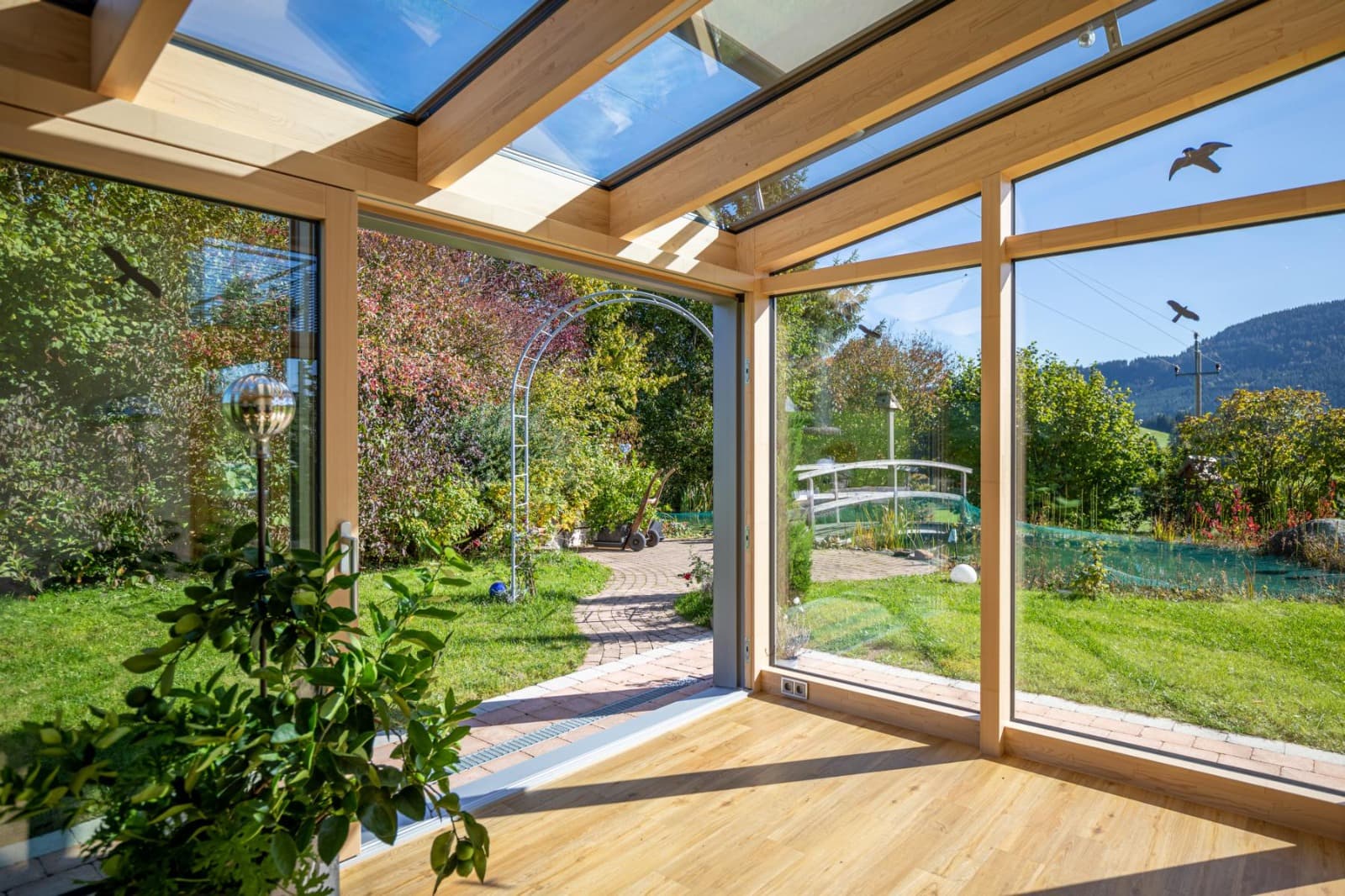 Glasdach fuer Carport stilvoll und funktional – ADA-Wintergarten Konzepte