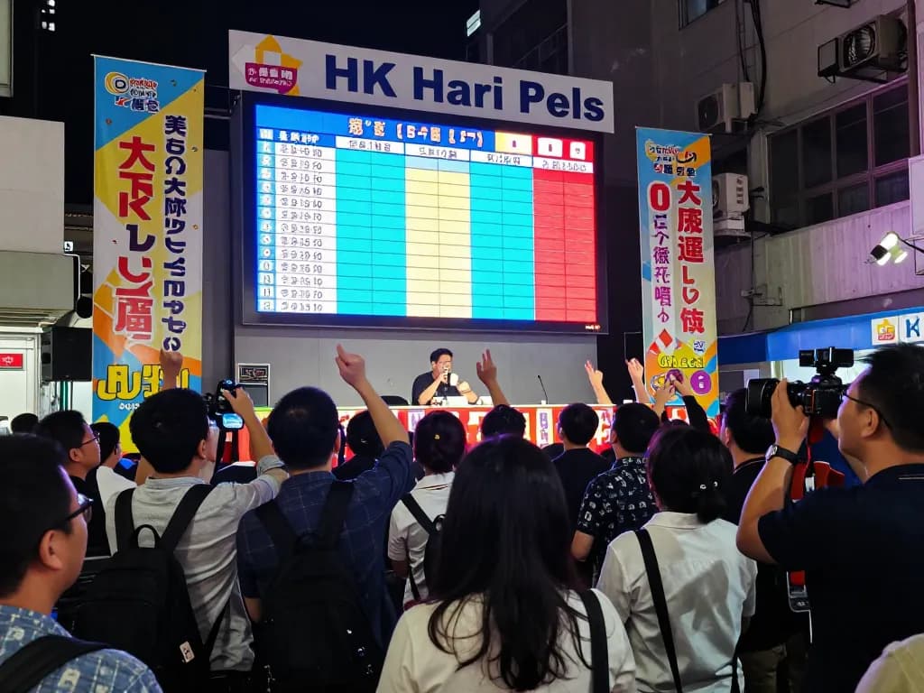 Exciting HK Hari Ini lottery drawing event with an enthusiastic crowd and colorful display.